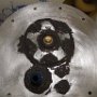 Fuel tank end cap with fuel fitting and fuel level sensor. Shown with tank sealant