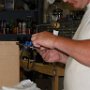 Installing gasket to fule tank end cap with tank sealant