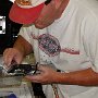 Installing mounting bracket for fuel distribution module