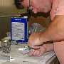 Deburring holes in bracket