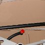 Installing of protective boot on rudder cable 