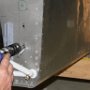 Drilling holes for starter contactor