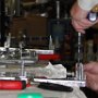Fitting of angled aluminum to avionics panel. Drilled , deburred and riveted angles to avionics panel.