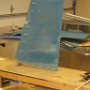 Rubber frame with skin clecoed in place