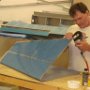 Dimpling vertical stabilzer skin