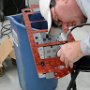 Cutting locations in avionics panel for 12 volt power, USB power and secondary music input.