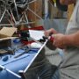 Drilling holes in rear flange of GPS support tray