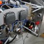 Installation of spark plug wiring between engine and distributor