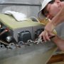 Clamping skybolt flanges to botton engine cowl