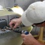 Drilling and clecoing skybolt flanges to bottom engine cowling