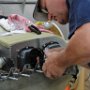 Riveting the skybolt flanges to the bottom engine cowl