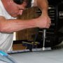 Back riveting avionics panel brackets to top forward fuselage skin