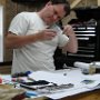 Measuring for holes to be drilled into the autopilot pitch servo bracket