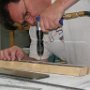 Drilled holes into skirts where previously marked