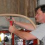 Drilling hole through rollbar and support tube