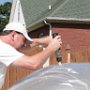 Drilling hole through top of canopy for the canopy latch to be installed later 