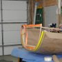 Pulled canopy frame inward by 1/2 inch to compensate for canopy glass expansion after final assembly