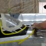 Sanding areas around windshield and fuslage in preperation for sikaflex primer