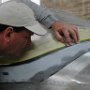 Sanding Botton Edge of Windshield Prepping for Fiberglass