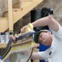Sanding New Fabricated Extension to Proper Level