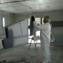 Darin Using Tack Cloth for Final Wipedown of Parts