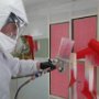 Spraying Pearl Red on Landing Gear Fairings