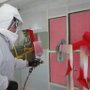 Spraying Pearl Red on Landing Gear Fairings