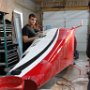 Wesley Sanding Right Side of Fuselage. Paul Wiping Down Fuselage